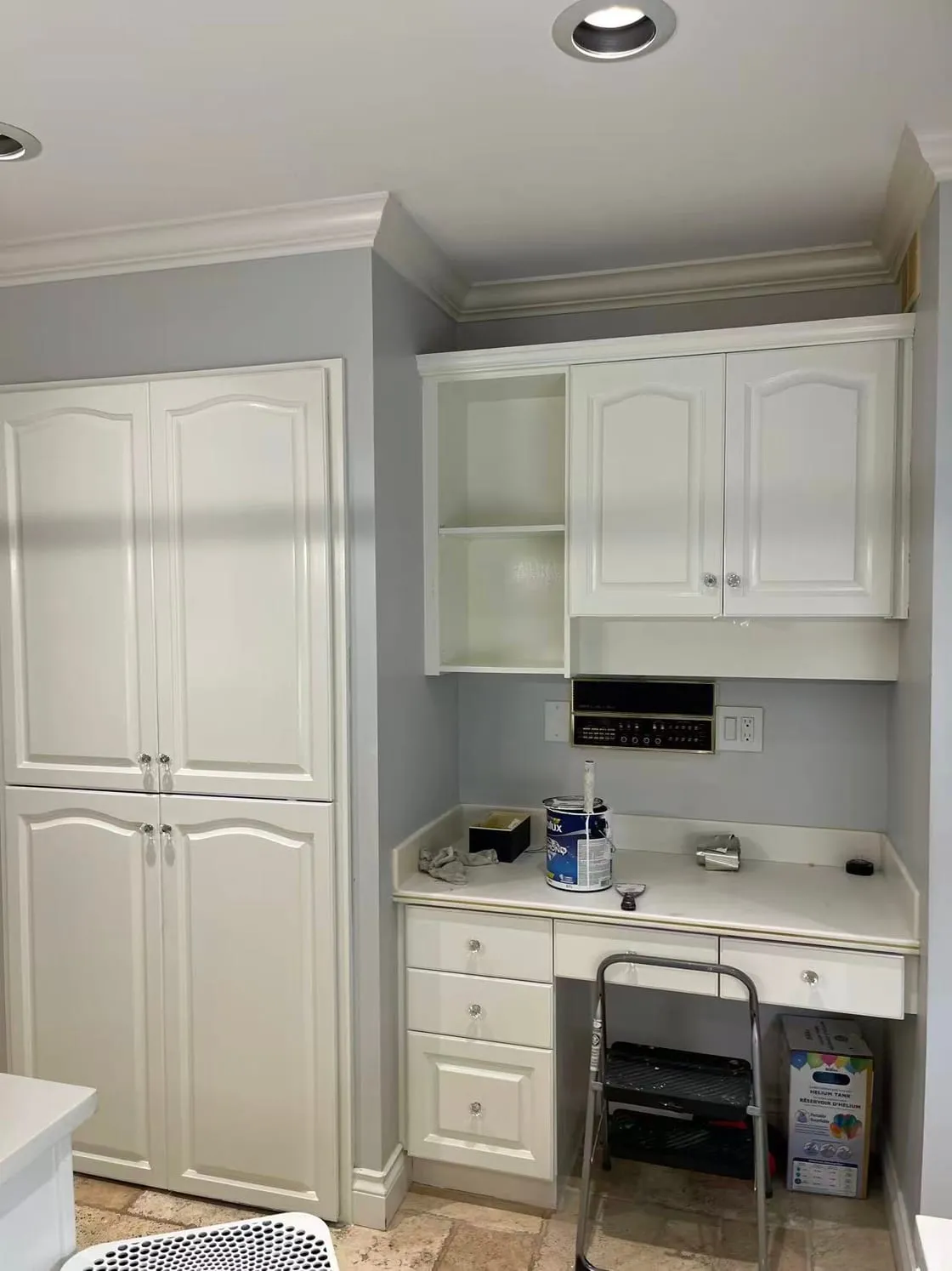 Interior cabinetry and painting tools during work in the Mayda project archive